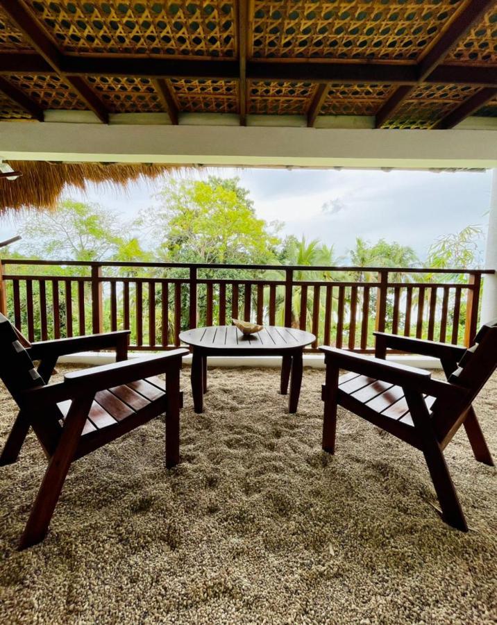 Amun Ini Beach Resort & Spa Anda  Exterior photo