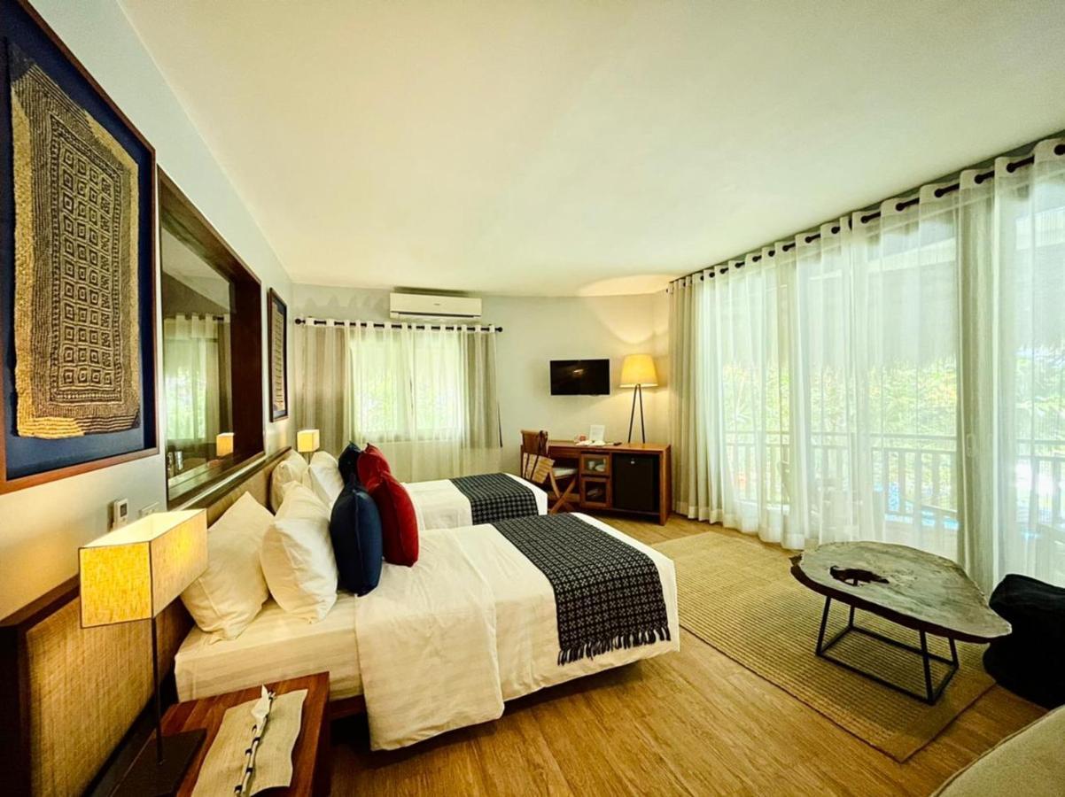 Amun Ini Beach Resort & Spa Anda  Exterior photo