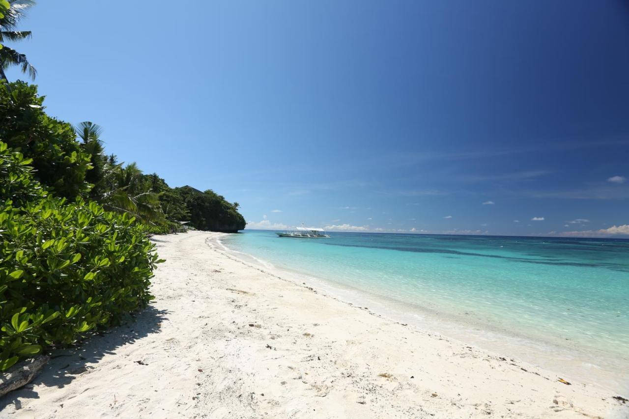 Amun Ini Beach Resort & Spa Anda  Exterior photo