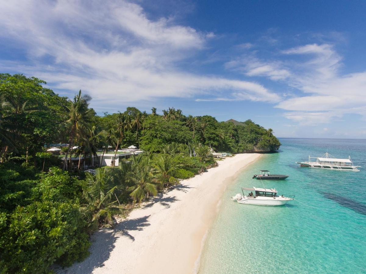 Amun Ini Beach Resort & Spa Anda  Exterior photo