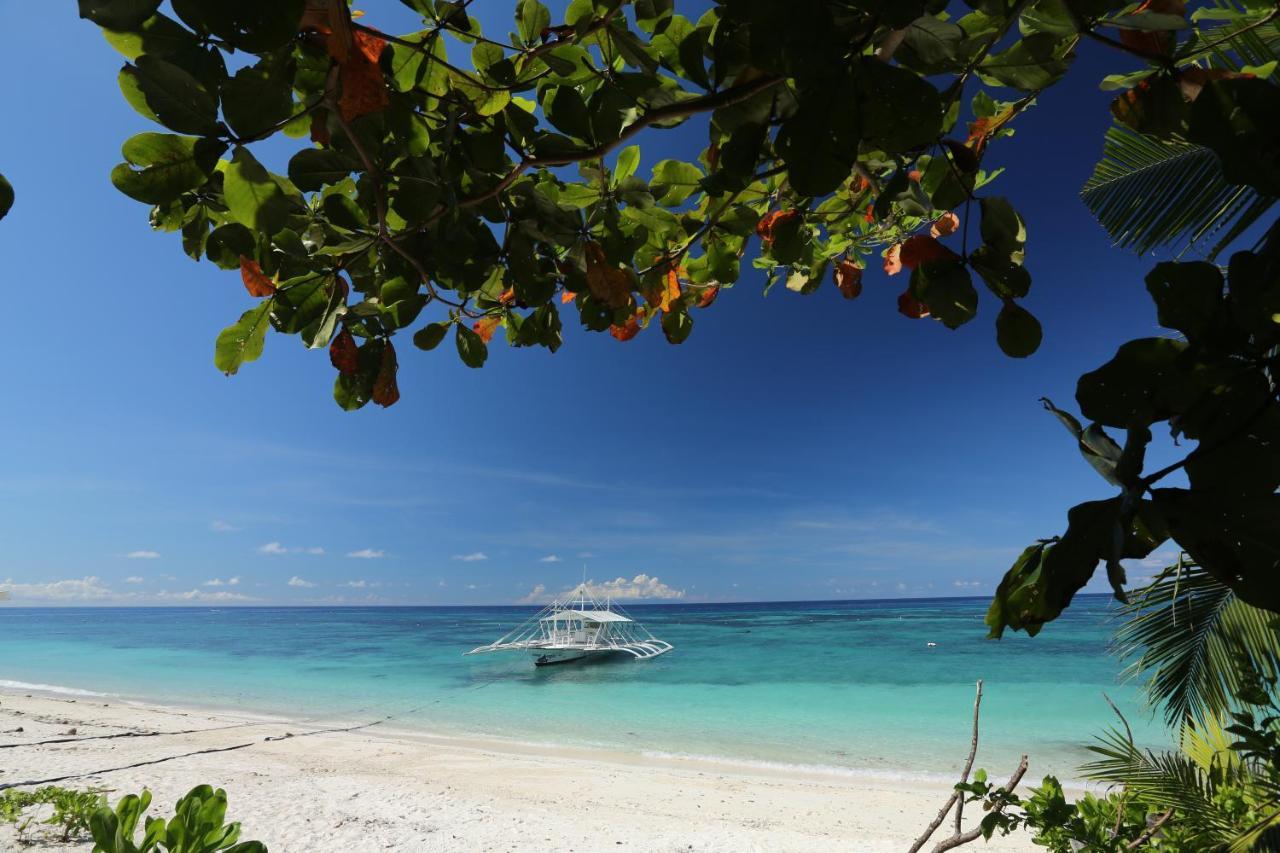 Amun Ini Beach Resort & Spa Anda  Exterior photo